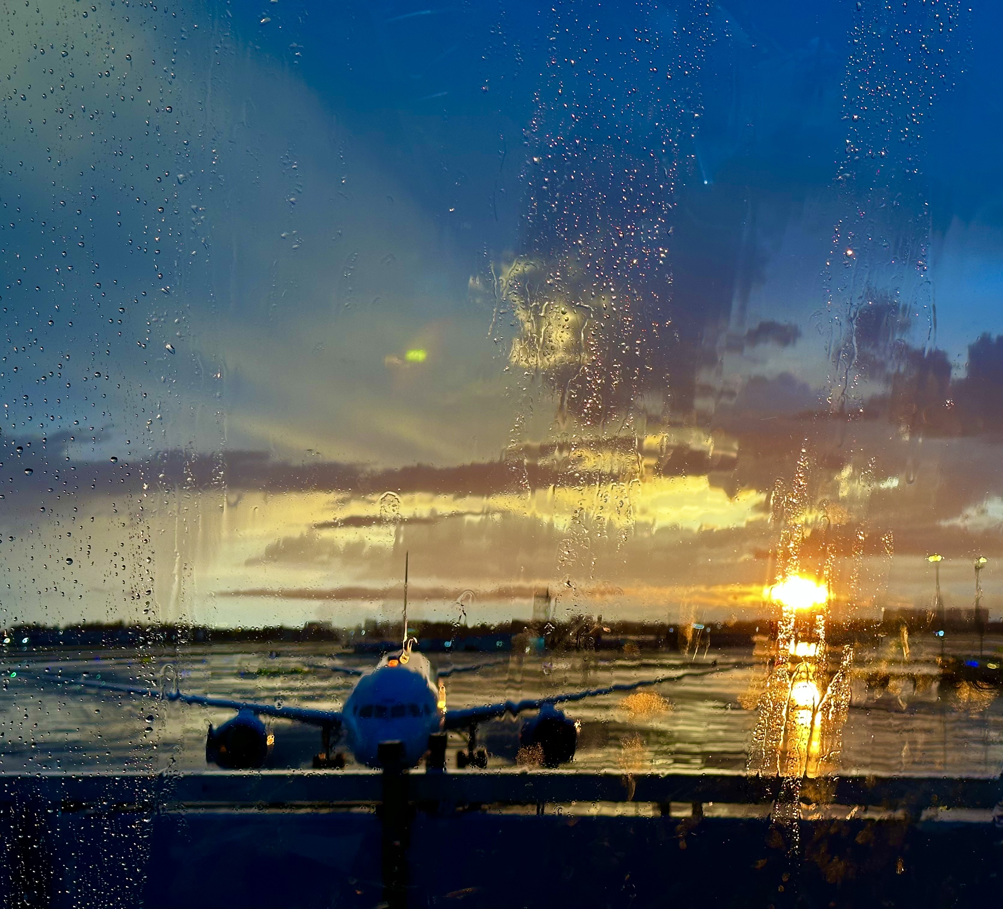Rainy sunset plane